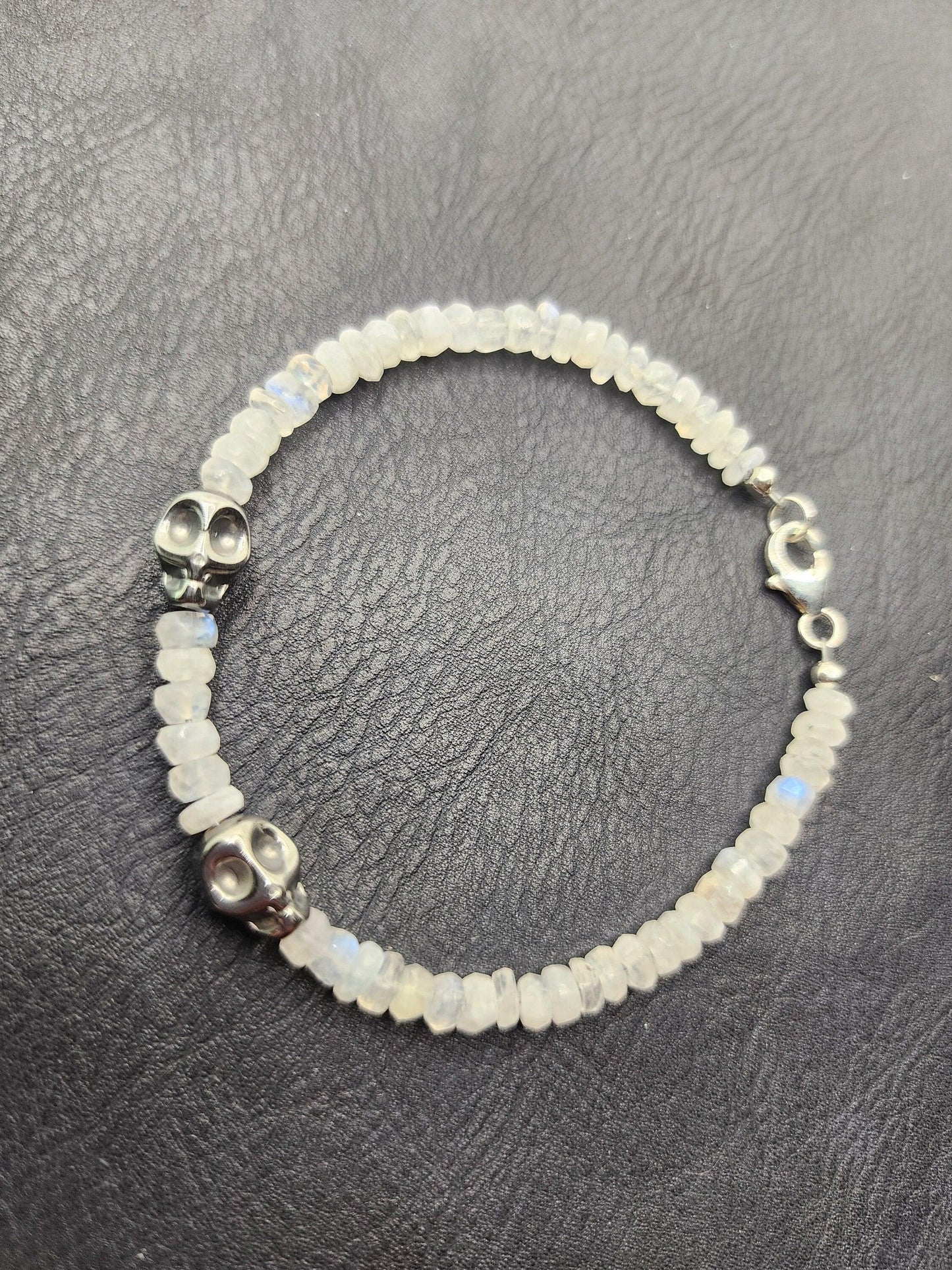Moonstone bracelet with hematite skulls. Sterling silver clasp and accessories. - Beaunique Boutique